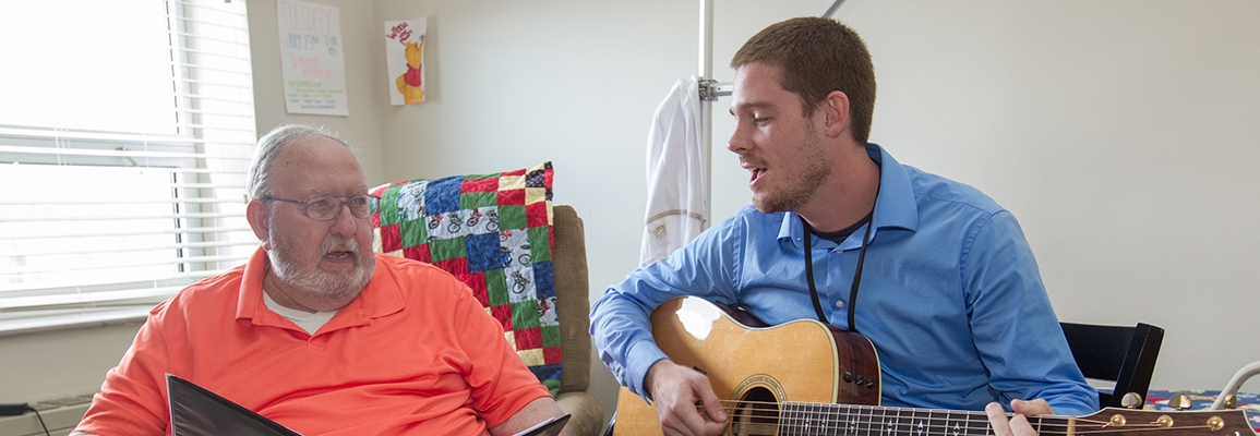 music therapy student and hospital patient